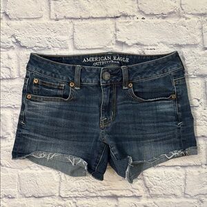 American Eagle Low Rise Shortie Jean Shorts Raw Cut Off Hems Blue Denim Size 2